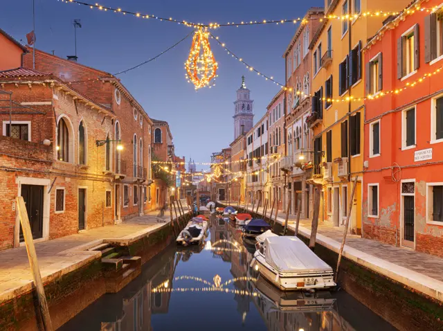 venice italy cityscape over canals at twilight with christmas lights 2